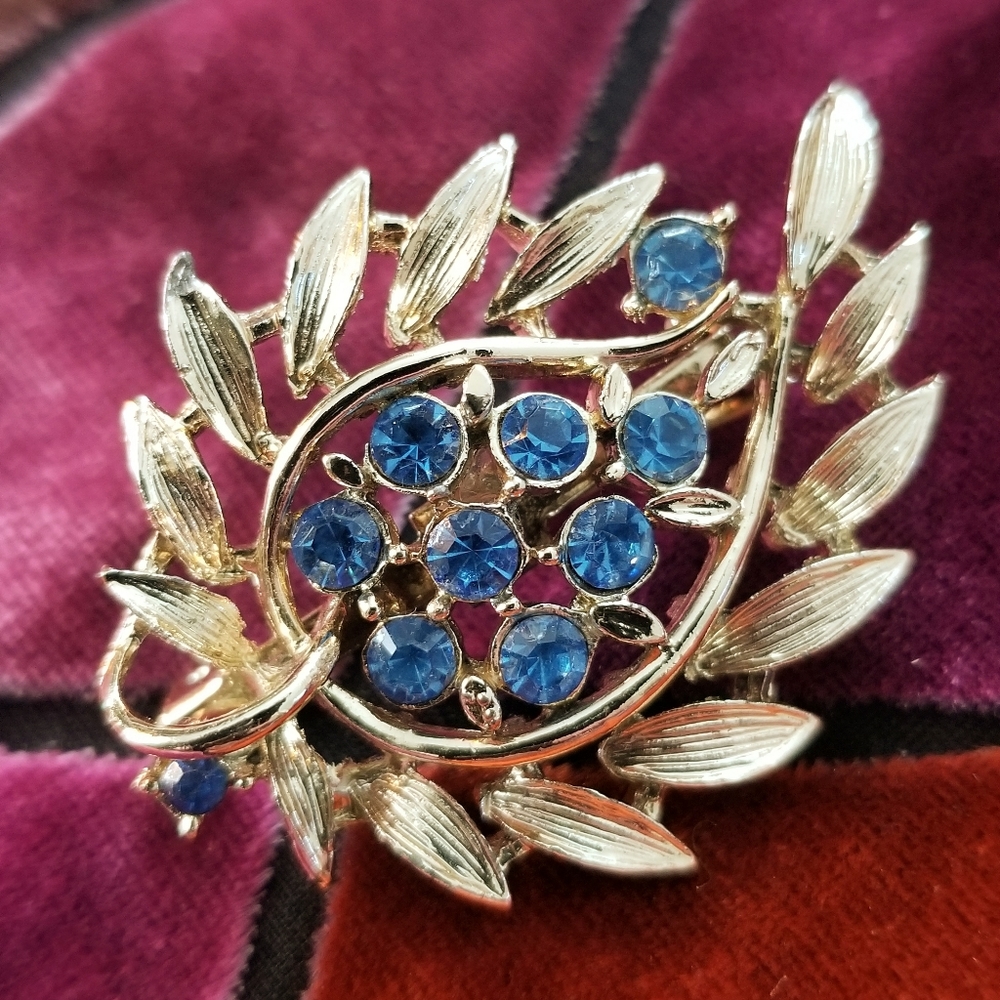 Vintage blue rhinestone brooch pale gold tone leaf leaves paisley pin